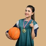 a-woman-holding-basketball-by-fotos-at-unsplash