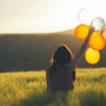 woman-about-to-release-balloons-by-catalin-pop-noyd-at-unsplash