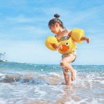 kid-dancing-sea-waves-leo-rivas-unsplash