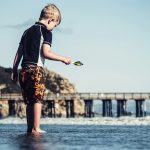 mom-and-child-walking-on-the-sunset-beach-by-tim-hufner-at-unsplash