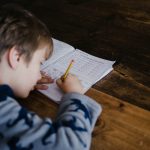 little-boy-answering-his-assignment-annie-spratt-unsplash