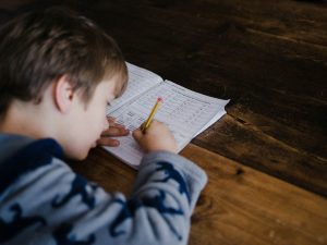 little-boy-answering-his-assignment-annie-spratt-unsplash